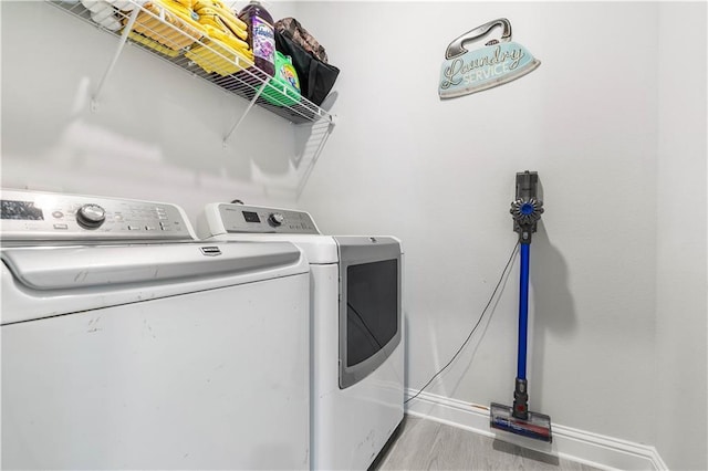 laundry area with washer and clothes dryer