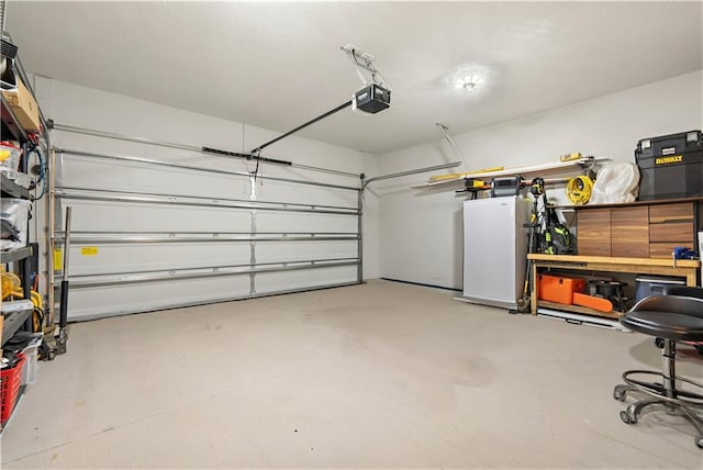 garage featuring a garage door opener