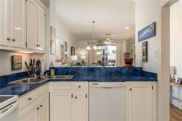 50 Forney Johnston Dr Unit 7A, Dauphin Island, AL 36528 - kitchen with white cabinetry, white appliances, dark countertops, and a sink