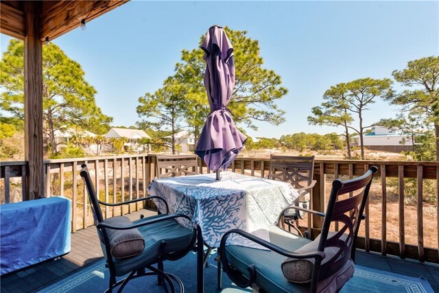 50 Forney Johnston Dr Unit 7A, Dauphin Island, AL 36528 - wooden terrace with area for grilling