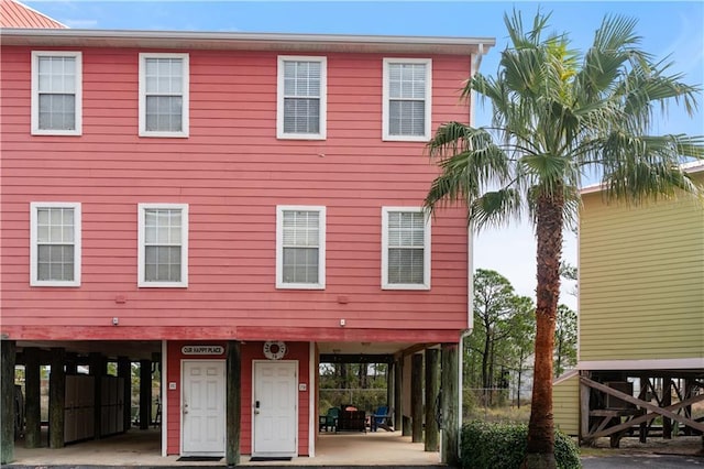 view of front of home with a carport