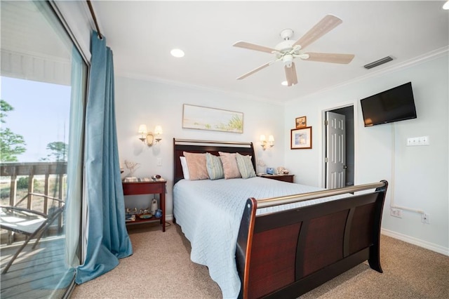 carpeted bedroom with ceiling fan and crown molding