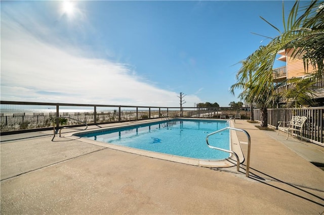 view of pool featuring a patio area