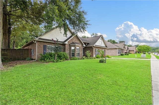 view of front of home with a front lawn