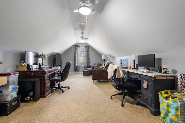 carpeted office space with lofted ceiling and ceiling fan