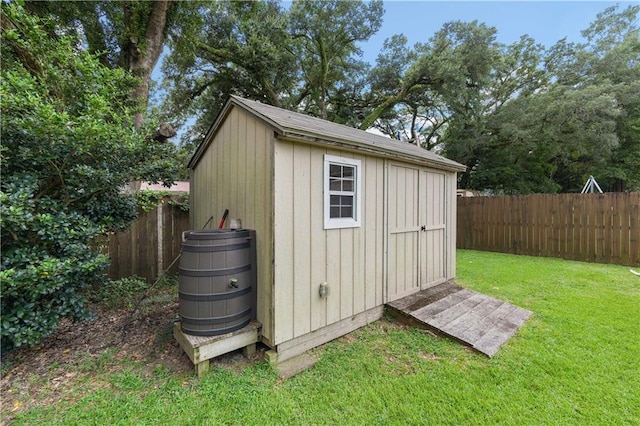 view of outdoor structure with a yard