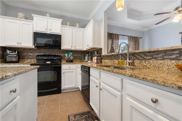 kitchen featuring white cabinetry, black appliances, ceiling fan, sink, and backsplash