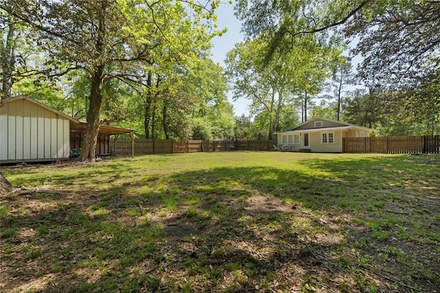 view of yard with a fenced backyard