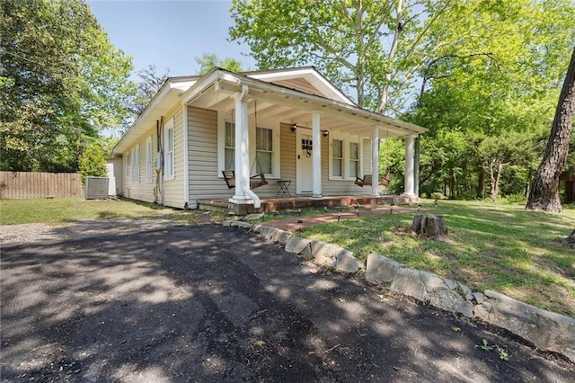 bungalow with fence and a porch