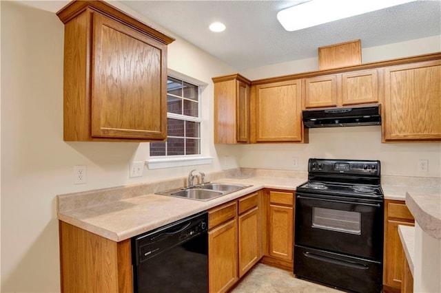 kitchen with sink and black appliances