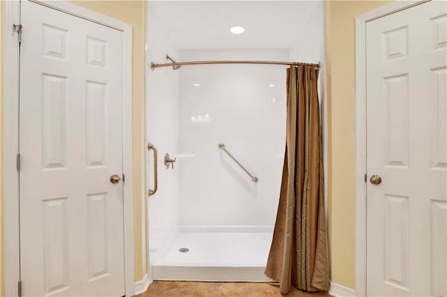 bathroom with a shower with curtain