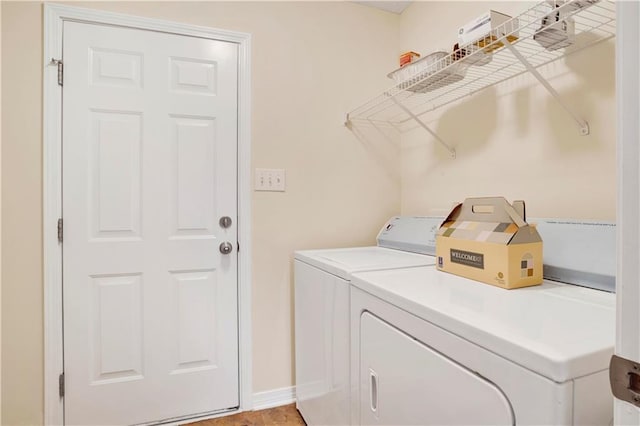 washroom with separate washer and dryer