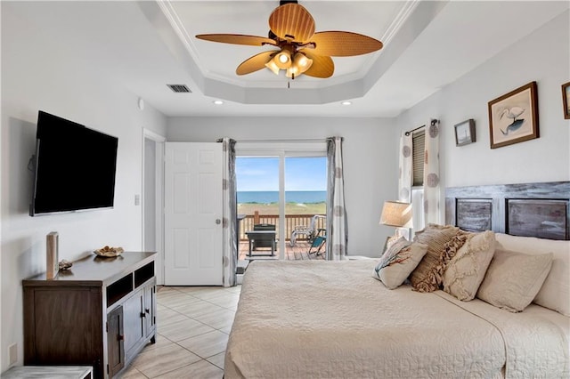 bedroom with visible vents, crown molding, light tile patterned flooring, a raised ceiling, and access to outside