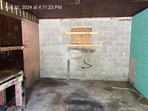 basement with concrete block wall