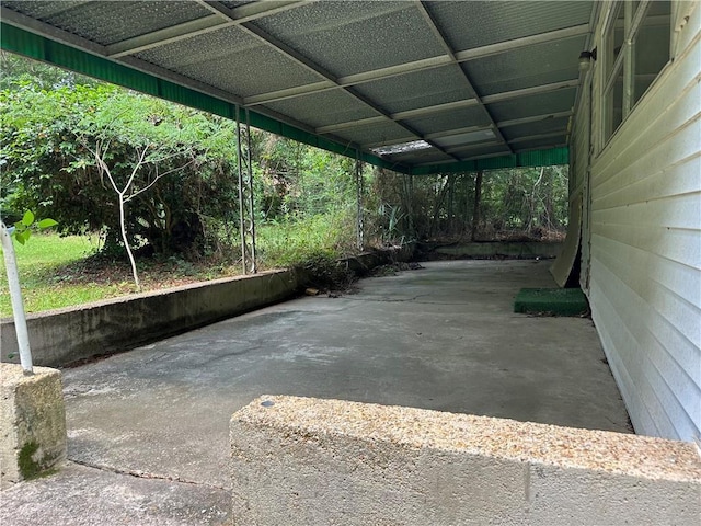334 Avondale Ave, Satsuma, AL 36572 - view of parking / parking lot with a carport