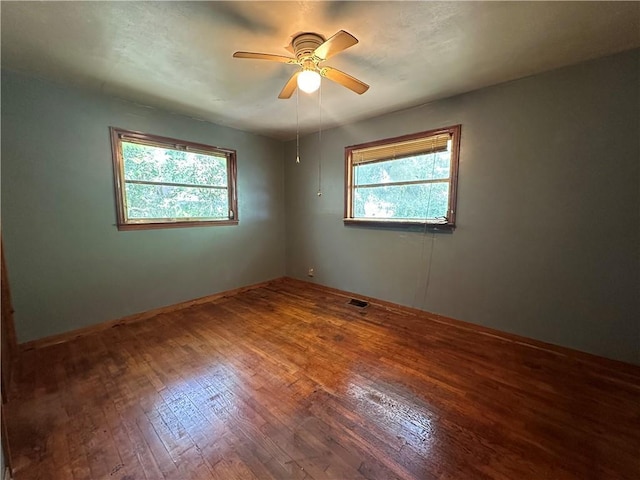 334 Avondale Ave, Satsuma, AL 36572 - empty room featuring wood finished floors and ceiling fan