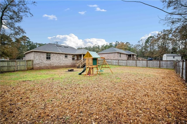 view of yard featuring a playground