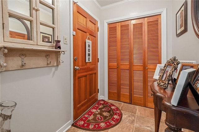 entrance foyer featuring ornamental molding