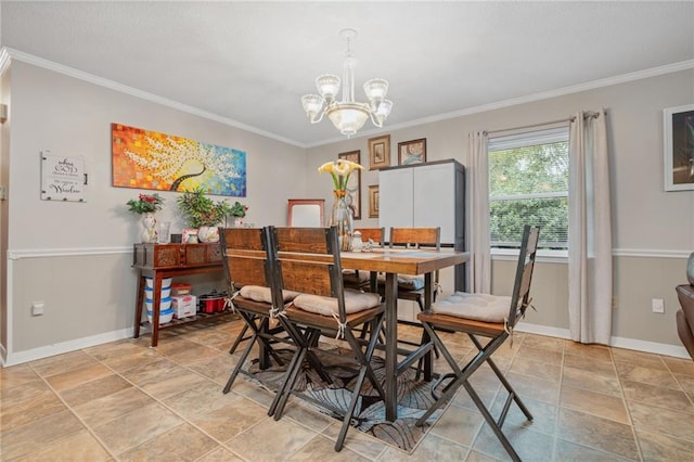 dining room with crown molding and a chandelier