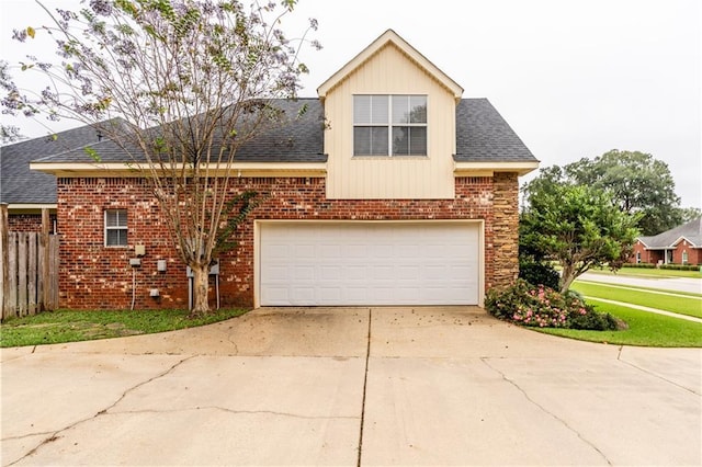 view of front of home with a garage