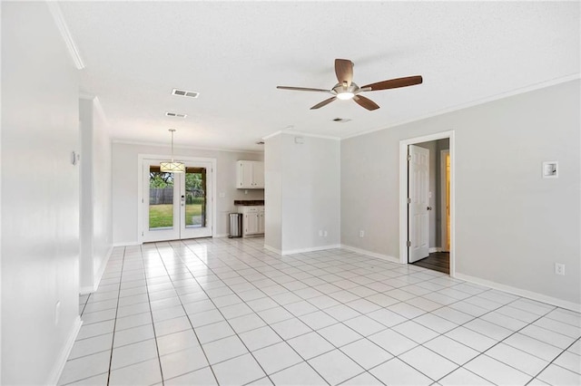 unfurnished living room featuring ceiling fan, light tile patterned flooring, and ornamental molding