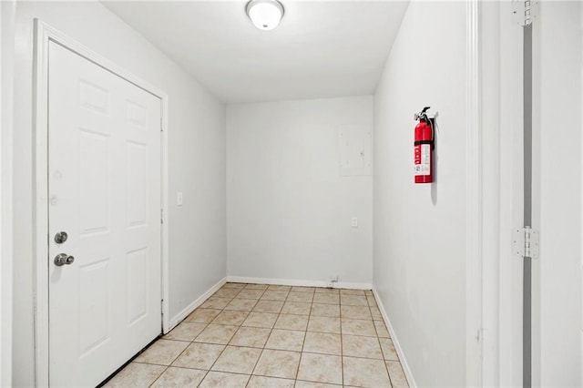 empty room featuring light tile patterned floors