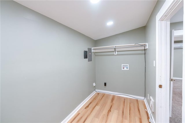 laundry area with hardwood / wood-style flooring and washer hookup