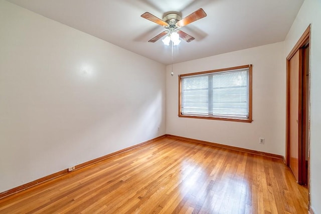 unfurnished bedroom featuring ceiling fan and light hardwood / wood-style floors