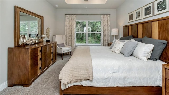 10676 Relic Rd N, Mobile, AL 36608 - carpeted bedroom featuring multiple windows