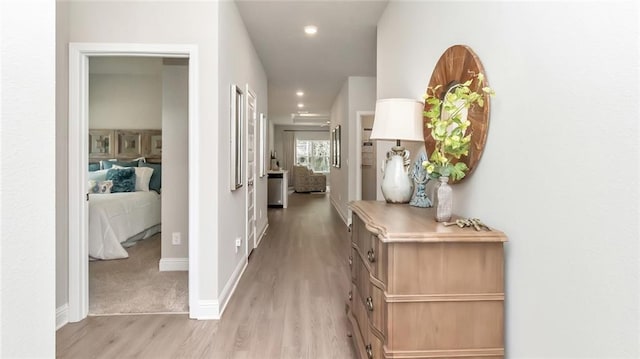 10676 Relic Rd N, Mobile, AL 36608 - hallway featuring light wood finished floors, baseboards, and recessed lighting