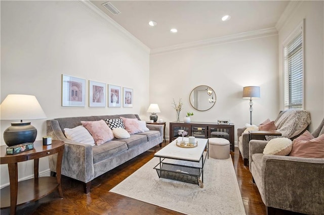 living room featuring dark wood-style floors, visible vents, recessed lighting, and ornamental molding