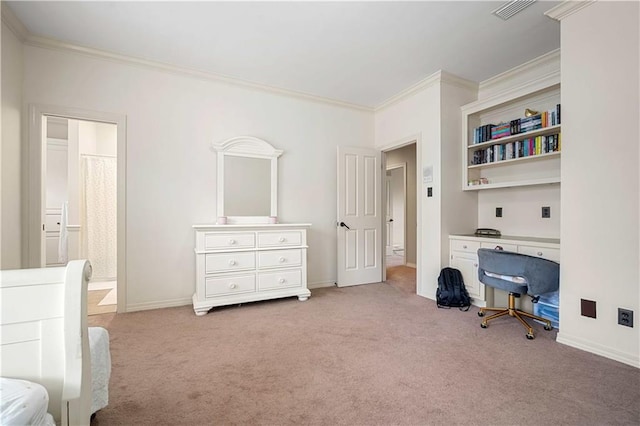 carpeted home office with visible vents, baseboards, and ornamental molding