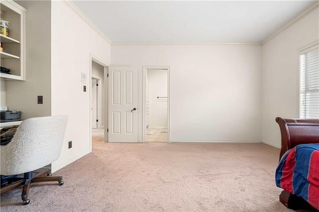 carpeted bedroom featuring baseboards and ornamental molding