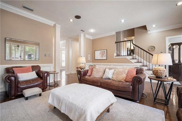 living room featuring visible vents, ornamental molding, wood finished floors, recessed lighting, and stairs