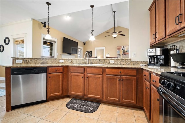 kitchen with brown cabinets, stainless steel dishwasher, a sink, black gas stove, and light stone countertops