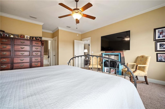 carpeted bedroom featuring visible vents, crown molding, a ceiling fan, and baseboards