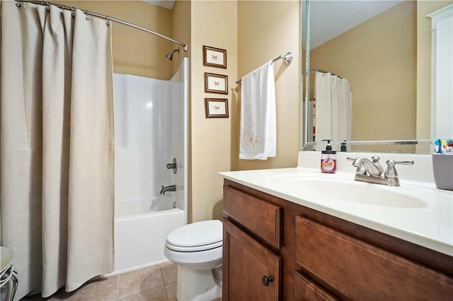bathroom featuring tile patterned floors, shower / bath combination with curtain, toilet, and vanity