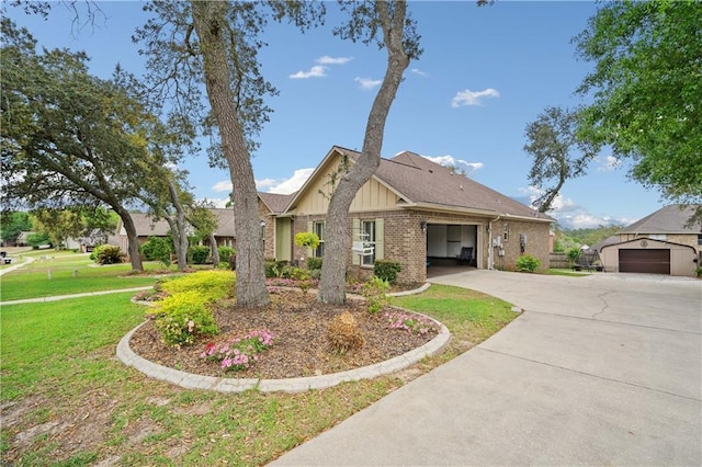ranch-style home featuring a front lawn, a garage, driveway, board and batten siding, and brick siding