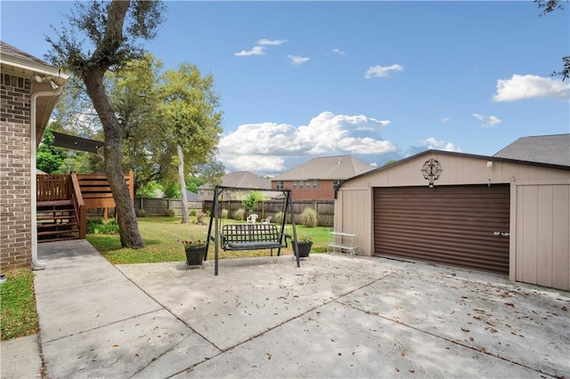 detached garage with fence
