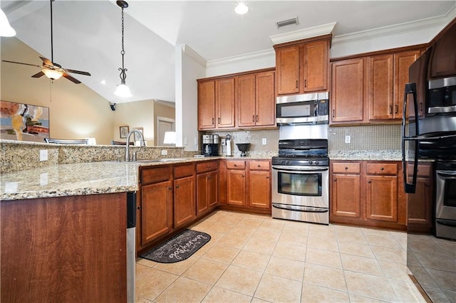kitchen featuring tasteful backsplash, light tile patterned floors, appliances with stainless steel finishes, brown cabinets, and ceiling fan