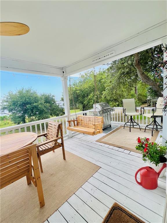 2026 Norman Ln, Gulf Shores, AL 36542 - wooden terrace with area for grilling