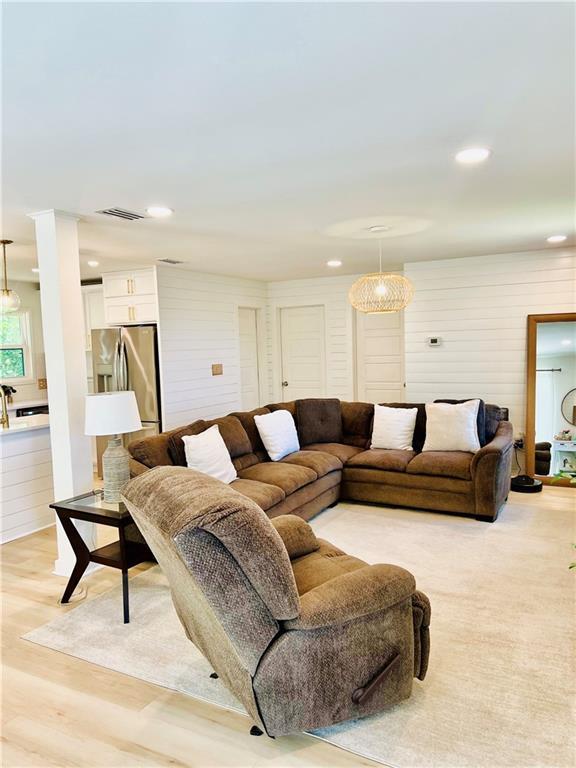 2026 Norman Ln, Gulf Shores, AL 36542 - living area with light wood-style floors, visible vents, and recessed lighting
