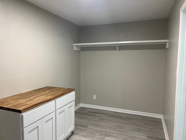 laundry room featuring light hardwood / wood-style flooring