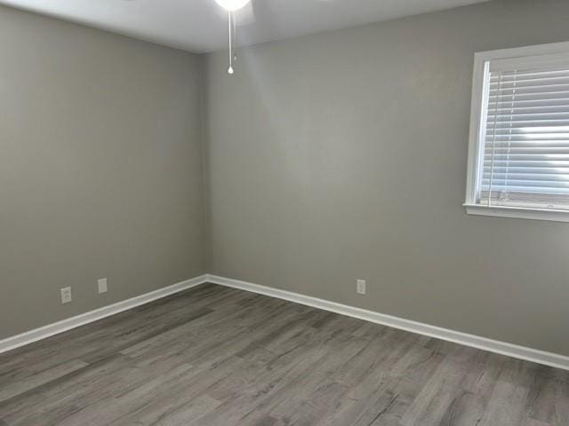 spare room featuring hardwood / wood-style flooring