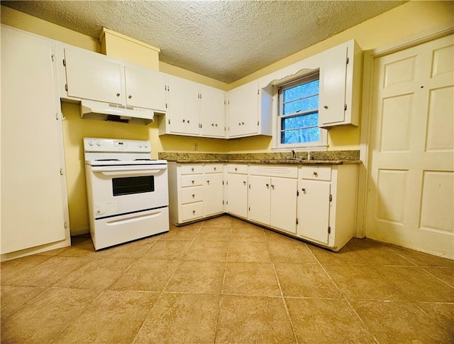 kitchen with electric stove, white cabinetry, and a textured ceiling