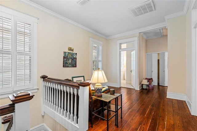 living area featuring crown molding and dark hardwood / wood-style floors