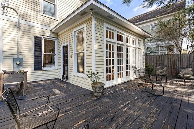 wooden deck featuring french doors