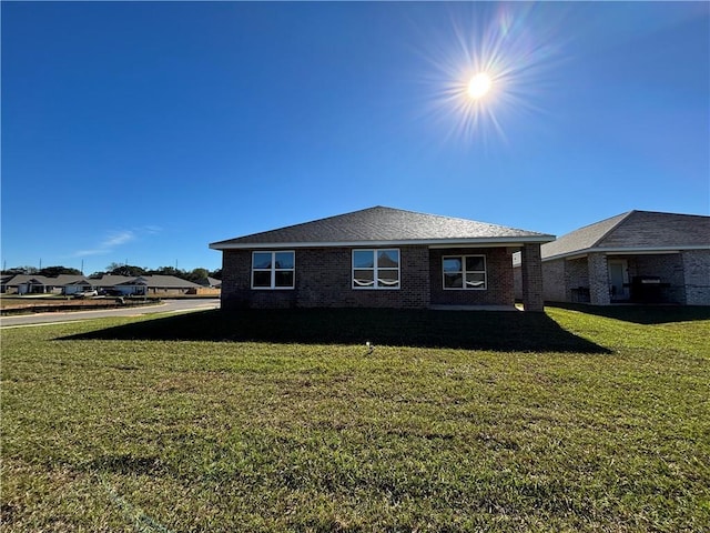 view of property exterior with a lawn