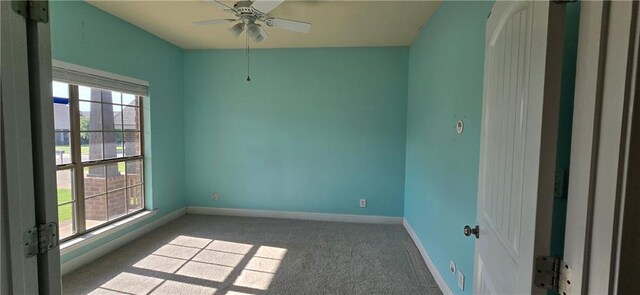2509 Hedgerow Dr, Mobile, AL 36695 - unfurnished room featuring carpet floors, a wealth of natural light, baseboards, and ceiling fan