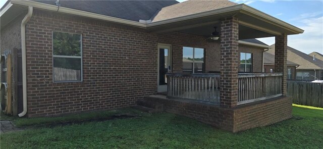 2509 Hedgerow Dr, Mobile, AL 36695 - back of property featuring brick siding, fence, and a yard